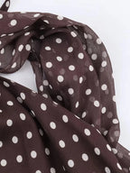 Haut chic à pois dos nu